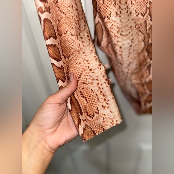 Wild Desires Tan Snake Print Long Sleeve One-Piece Swimsuit
Lulus - Picture 4 of 7